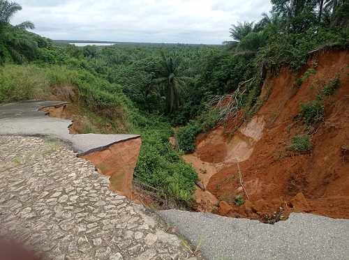 Portion of the road affected by gully erosion 